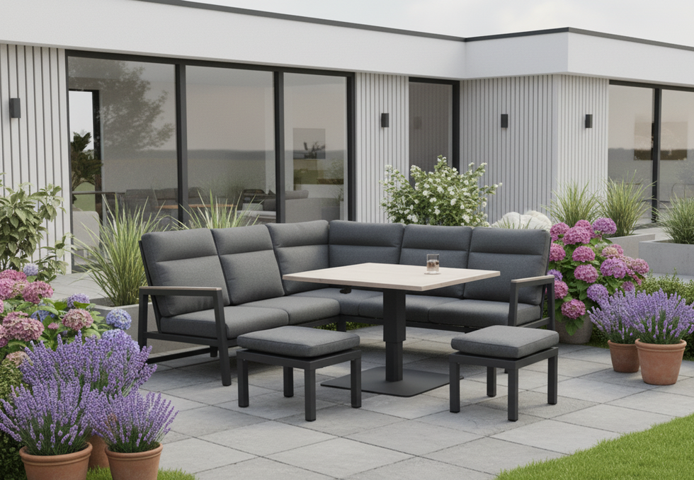 Kettler Charlbury Tudor Mini Corner Set with two footstools and a square high/low metal table in a modern outdoor furniture setting