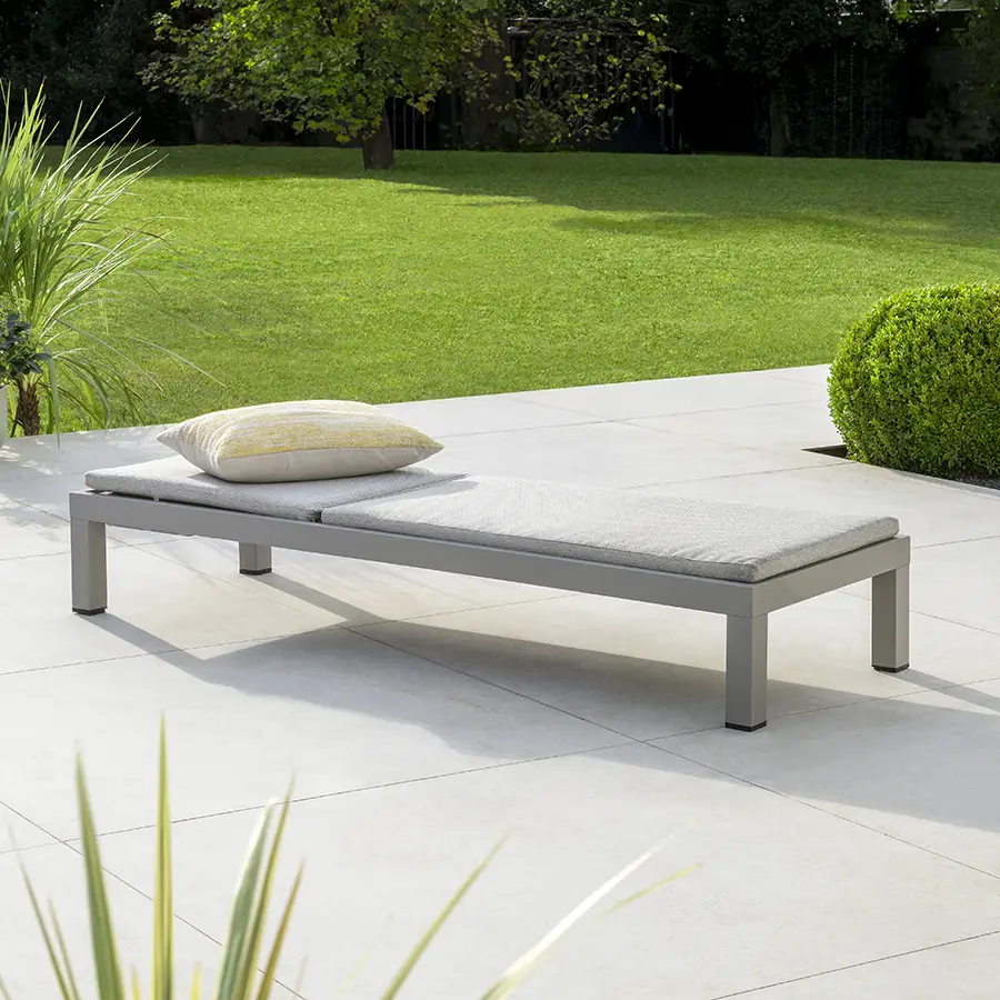 Kettler Pebble sun lounger with cushion, metal outdoor furniture for relaxing in the garden or patio setting.