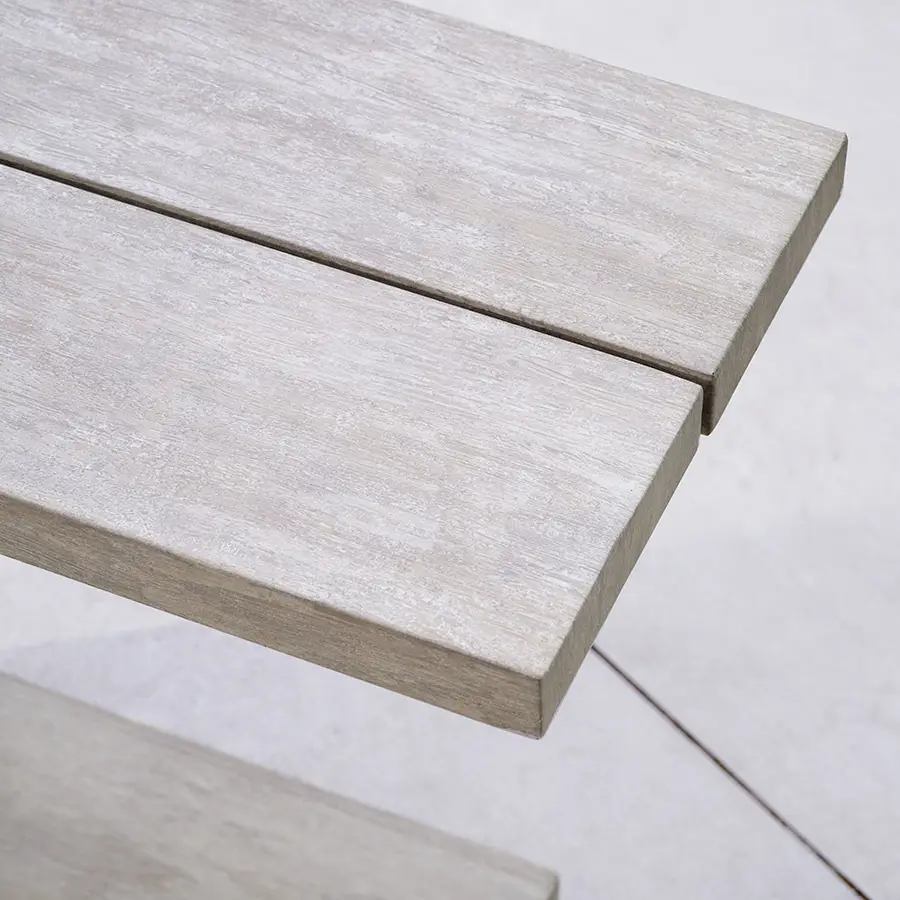 Kettler Pebble Drift side table with a metal frame, featuring a textured, pebble-inspired surface for modern living spaces