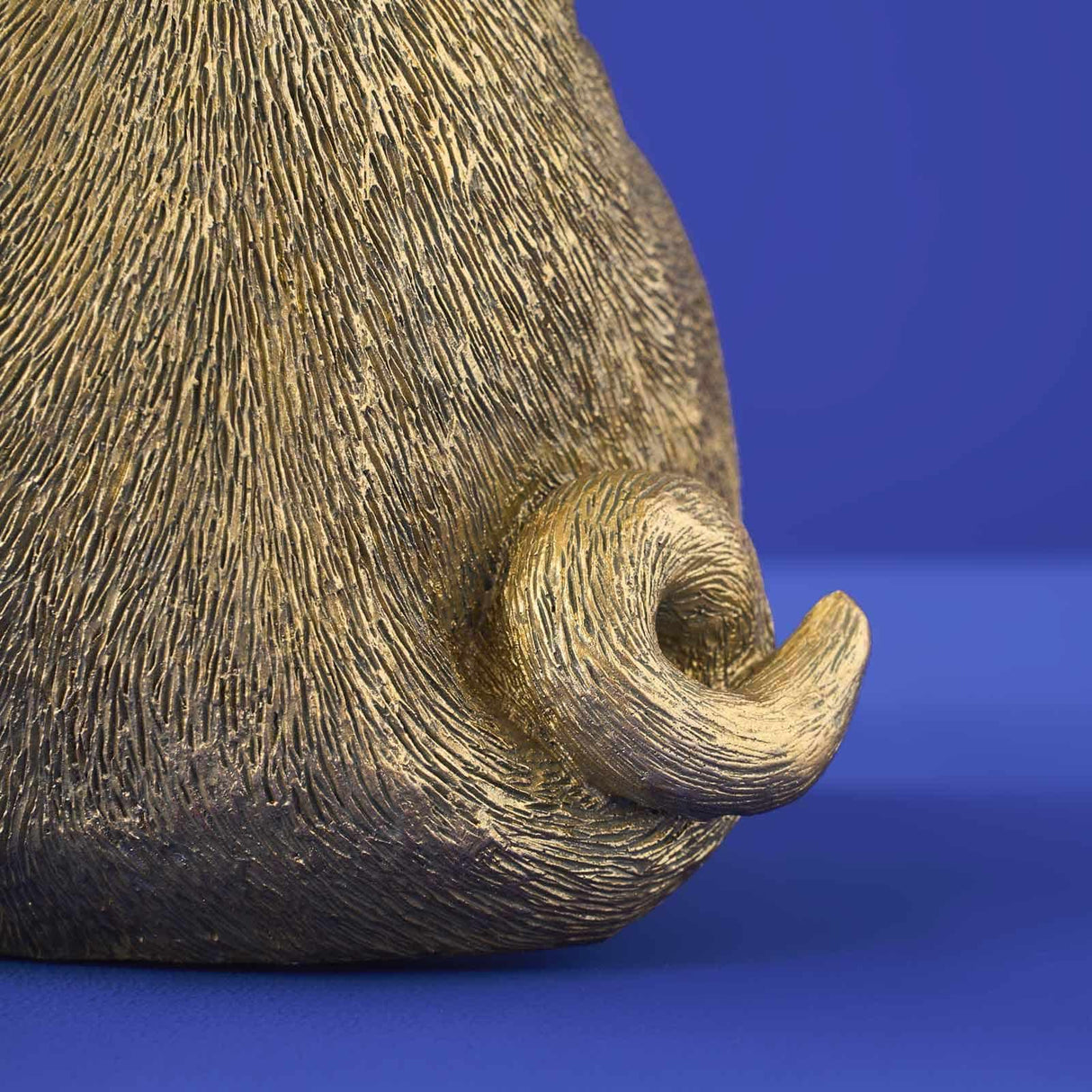Gold WERNS® Piggy Pig table lamp by Werner Vob, featuring a playful pig design and luxury statement lighting for indoor spaces.