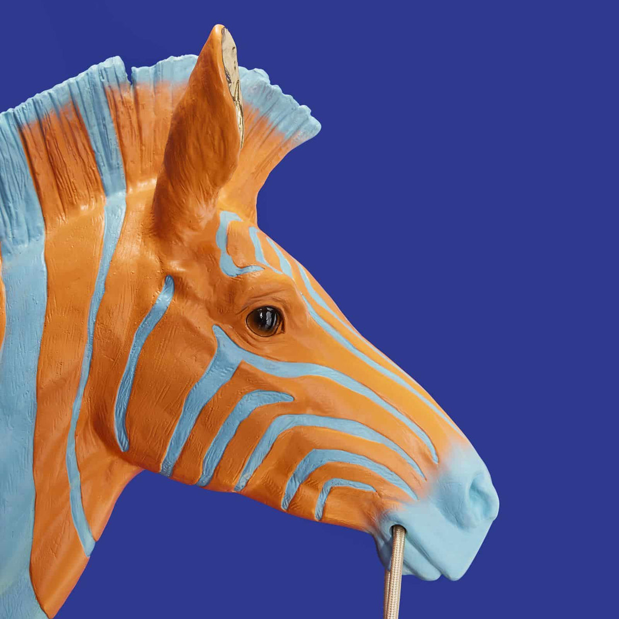 Blue and orange zebra wall lamp by Werner Vob, modern indoor lighting fixture featuring bold, stylish zebra design for statement decor.