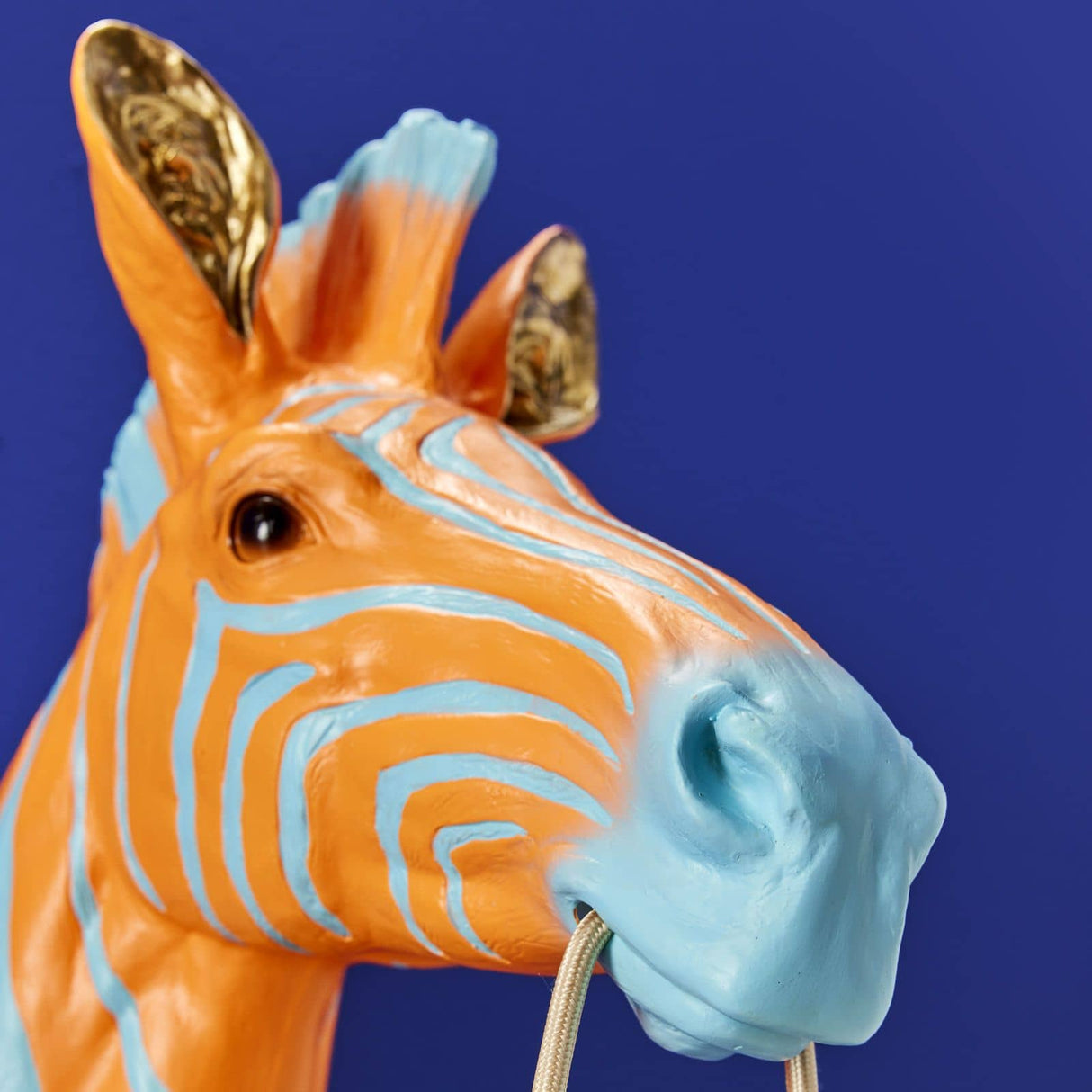 Werner Vob WERNS® Zebra Zora wall lamp in blue and orange, featuring a stylish zebra design for modern indoor lighting.