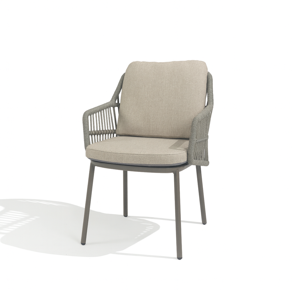 4 Seasons Outdoor Alicante dining set with Manolo 75cm round metal table and two cushioned chairs in Terre color.