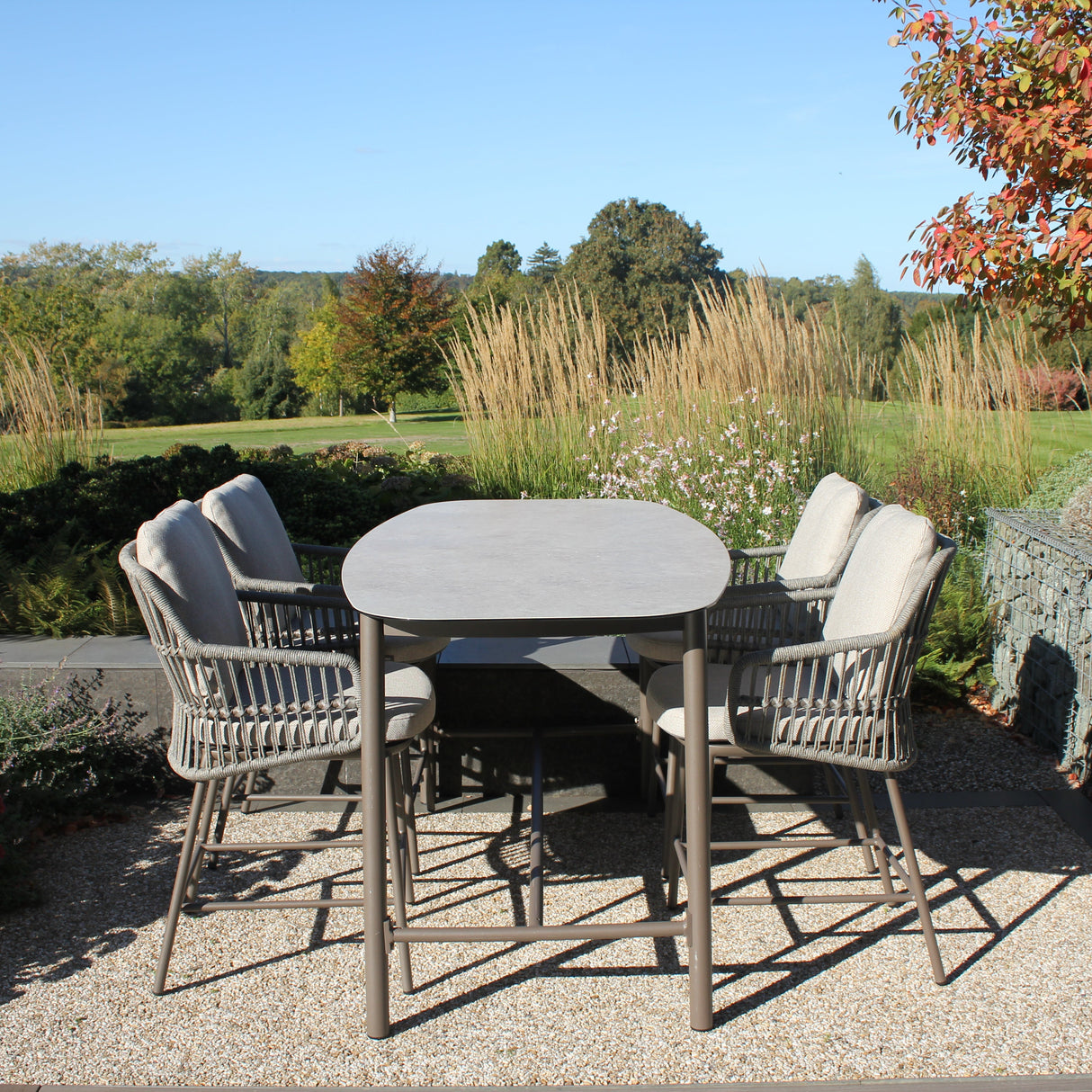 4 Seasons Outdoor Alicante 4-seat dining set with metal frame and Manolo 180cm high ceramic table, outdoor furniture for dining.