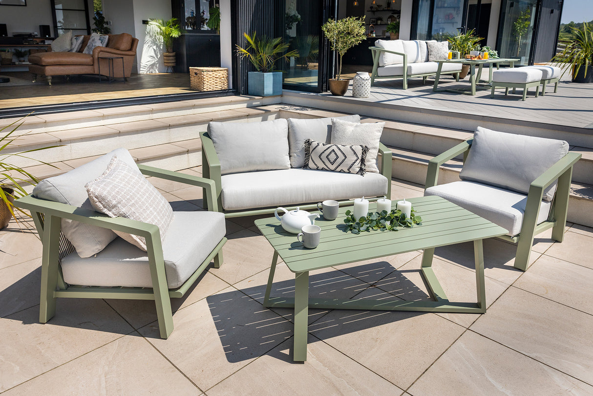 Hartman Alora 2-seat lounge set with sage green aluminum frame and cushions, outdoor garden furniture for relaxing in the garden.