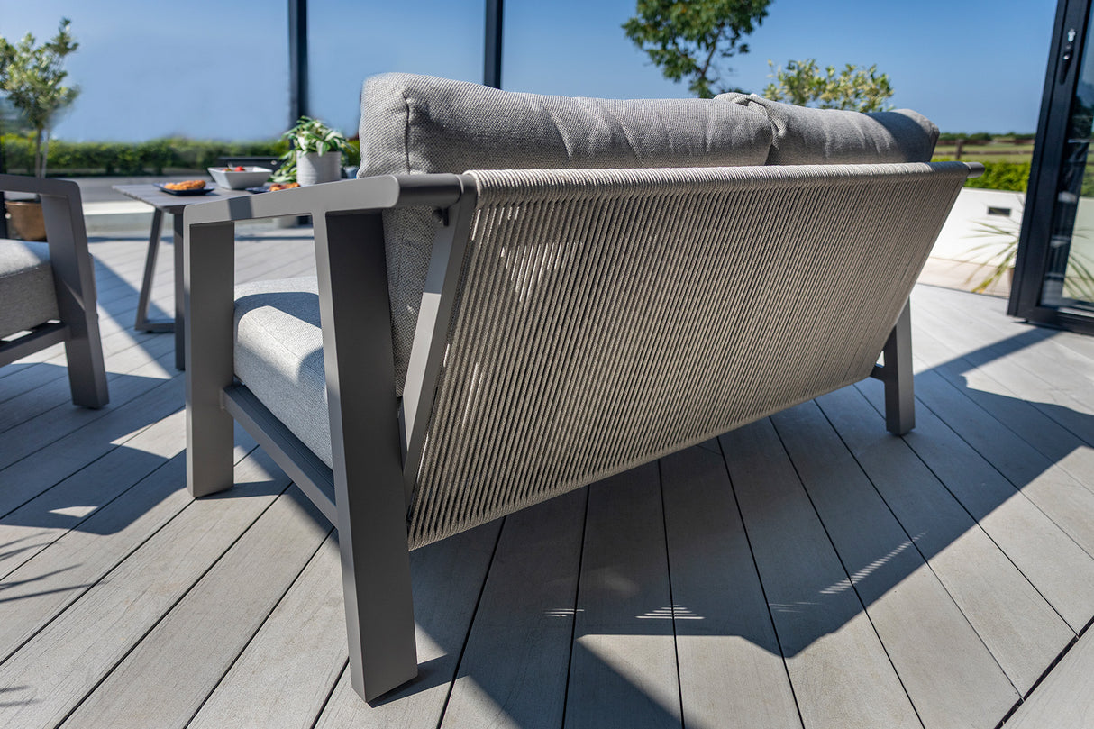 Hartman Alora 2-seat lounge set in taupe with metal frame, featuring cushioned seats and a modern outdoor furniture design.