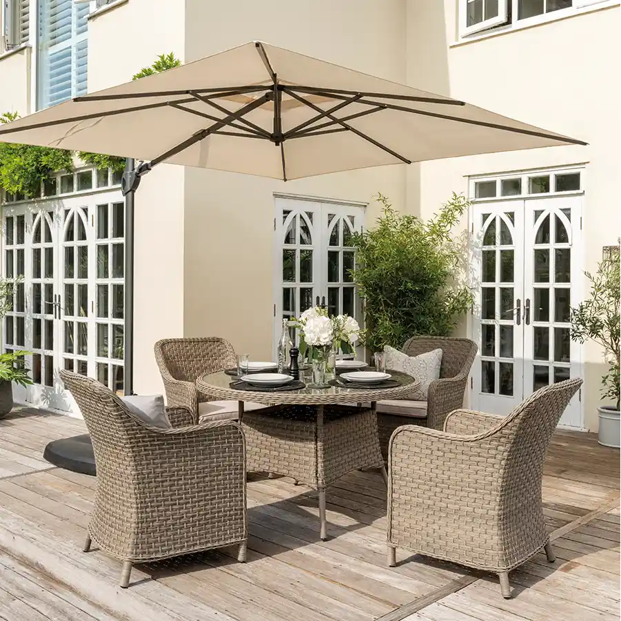 Kettler Charlbury Signature 4-seat dining set with woven table and chairs, outdoor furniture for patio or garden dining.