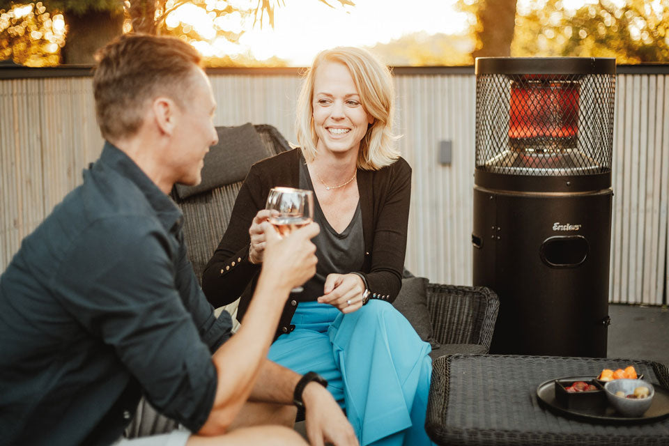Enders POLO® Black 2.0 patio heater showing a compact black metal outdoor heater with a reflector for outdoor heating.