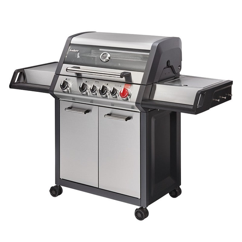 Enders Monroe Pro 4 SIK Turbo BBQ grill with cover, stainless steel lid, side shelves, and control knobs for outdoor cooking.