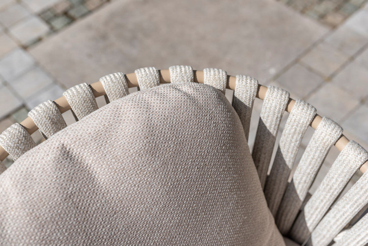 4 Seasons Outdoor Eva 6-seat metal dining set with Prado 180cm ceramic barrel table and matching dining chairs.