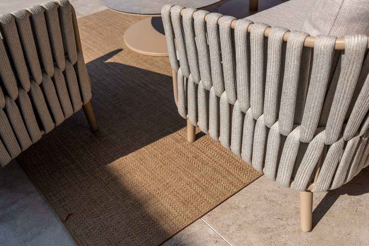 4 Seasons Outdoor Eva lounge set with two Monroe coffee tables and a support table, featuring metal frame and comfortable cushions.