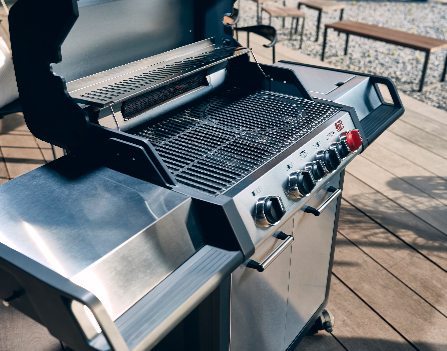 Enders Monroe Pro 4 SIK Turbo BBQ grill with lid, side shelves, and control knobs for outdoor cooking and grilling.