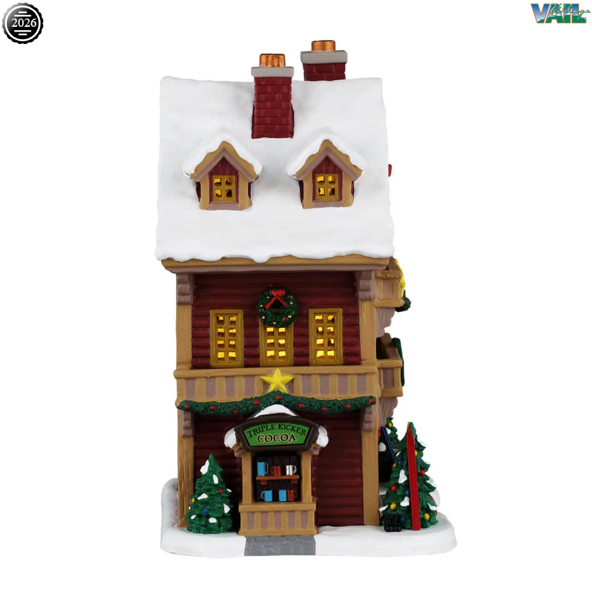 Lemax Mountain View Hotel illuminated building from Christmas village display, featuring detailed architecture and festive lighting.