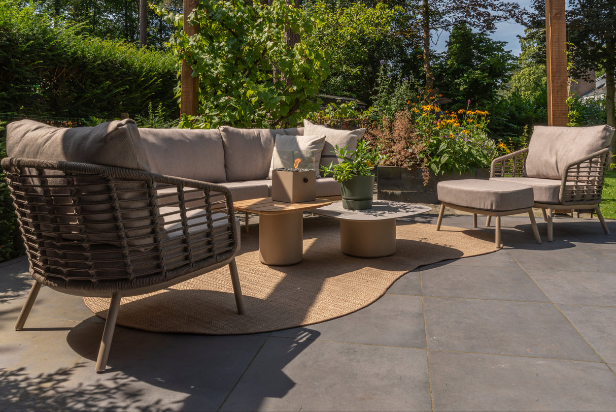 4 Seasons Outdoor Puglia Lounge LUX Set in Latte with a 3-seater sofa, chairs, footstool, and tables for outdoor use.