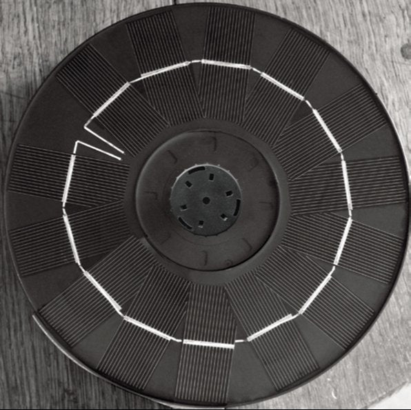 Creative Products solar fountain for indoor use, featuring a compact design with water spouting and solar panel.