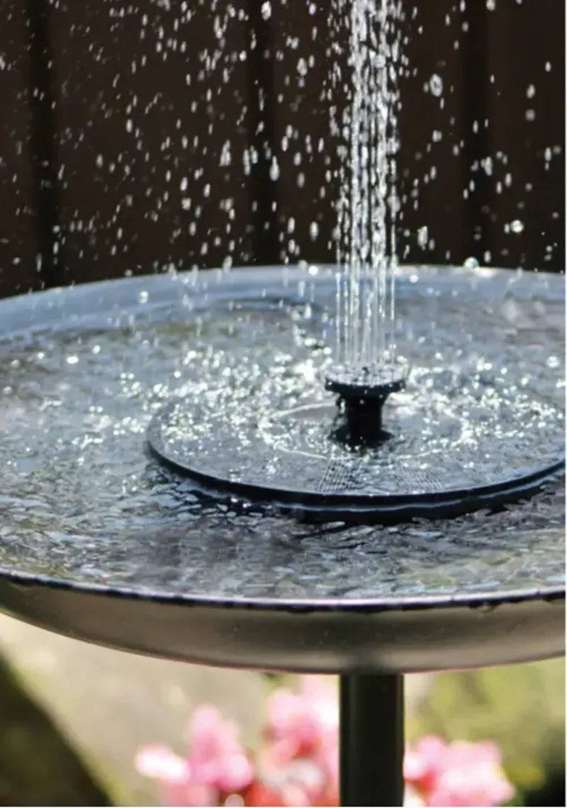 Creative Products solar fountain for indoor use, featuring a compact design with water spouting and solar panel.