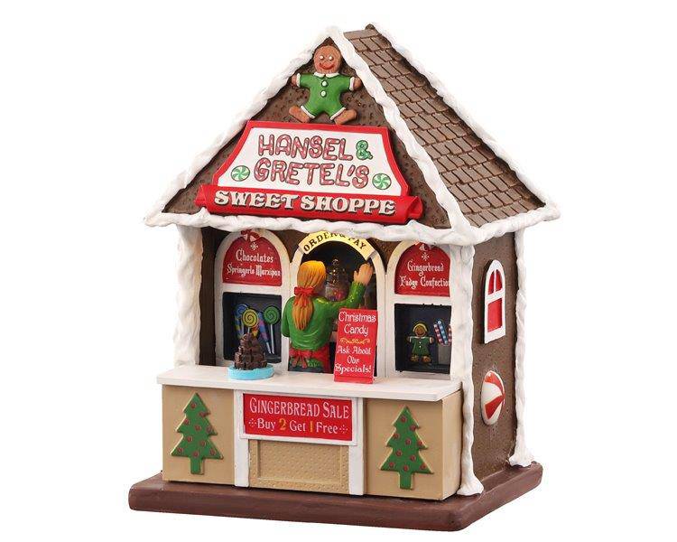 Lemax Christmas Village Hansel & Gretel's Sweet Shoppe table accent featuring a festive gingerbread shop with candy decor.