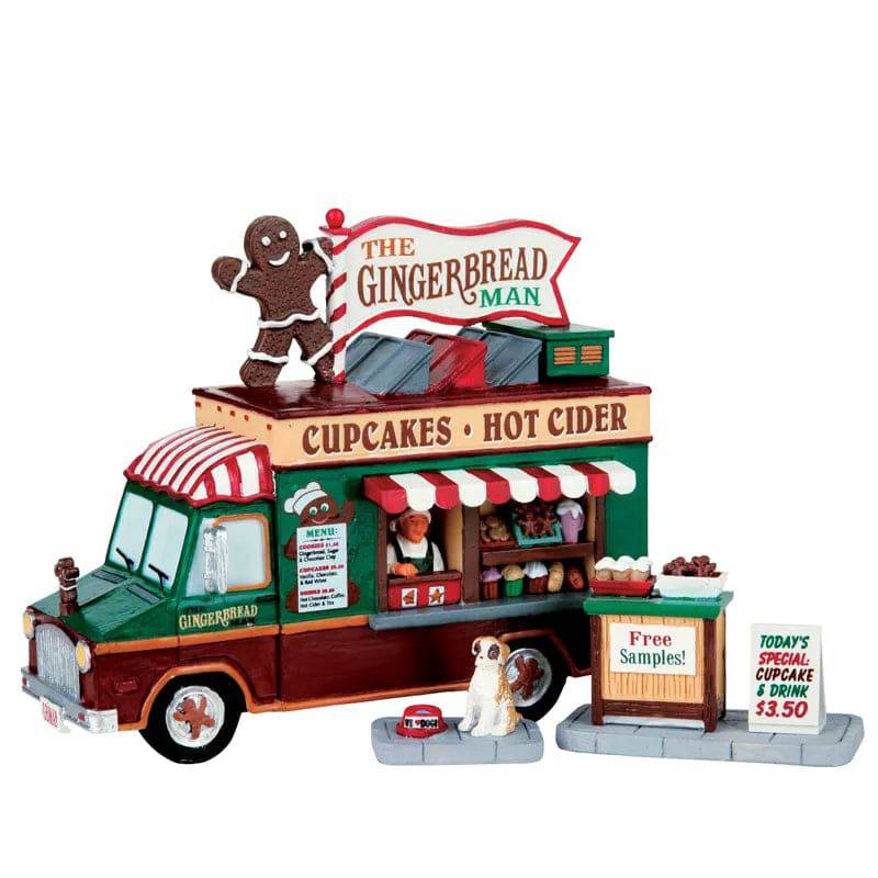 Set of three Lemax Gingerbread Man Christmas village table accents with festive holiday details and cheerful gingerbread figures.