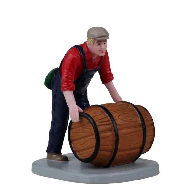 Lemax Christmas Village figurine of a wine barrel scene, detailed ceramic decor for holiday village displays.
