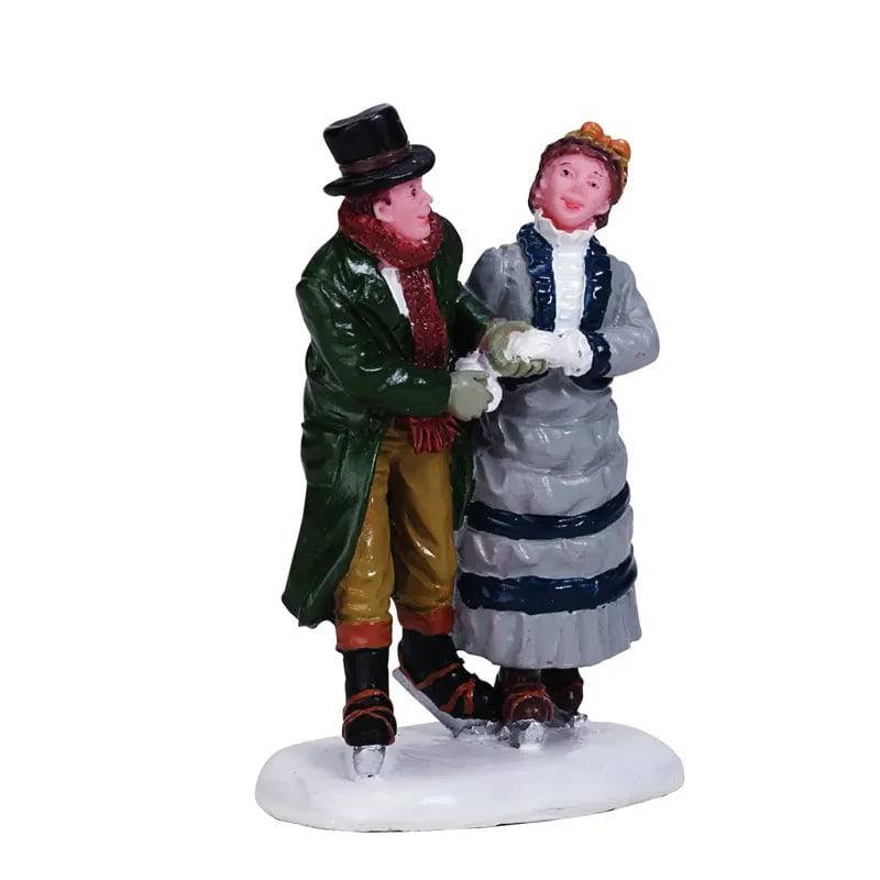 Lemax Winter Romance Christmas Village figurine featuring a festive winter scene with detailed holiday characters and decorations.