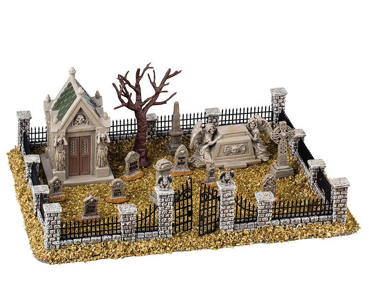 Lemax Spooky Town Haunted Souls Graveyard table accent featuring spooky tombstones and eerie graveyard scene for Halloween décor.