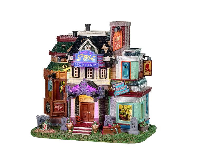 Lemax Spooky Town illuminated mortuary building with spooky details and glowing windows from the Lemax Spooky Town collection.