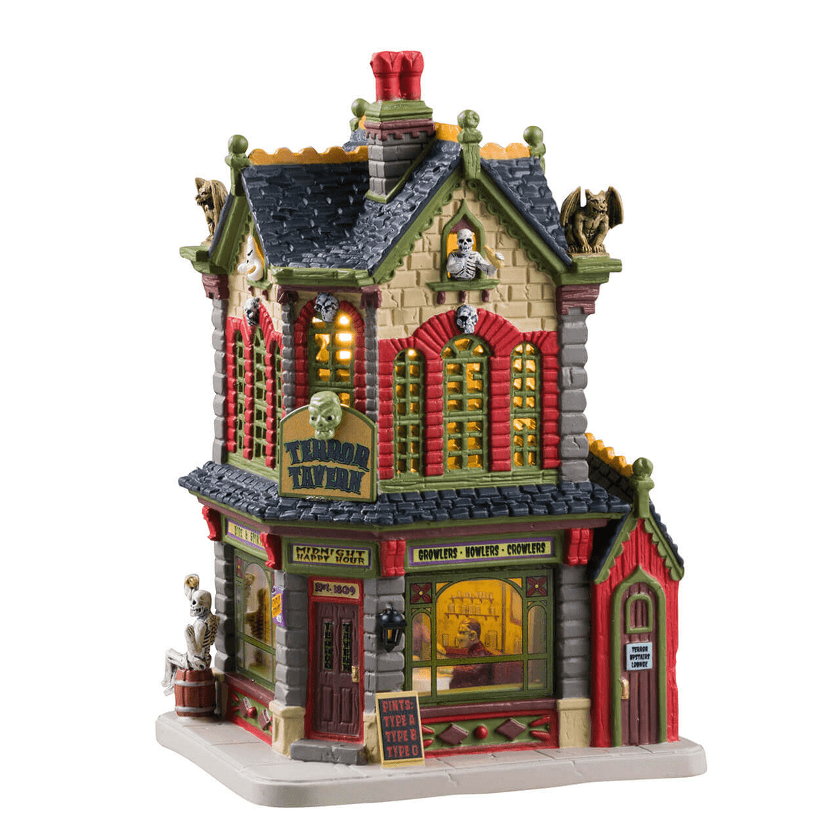 Lemax Spooky Town illuminated Terror Tavern building with spooky haunted house design and glowing windows.