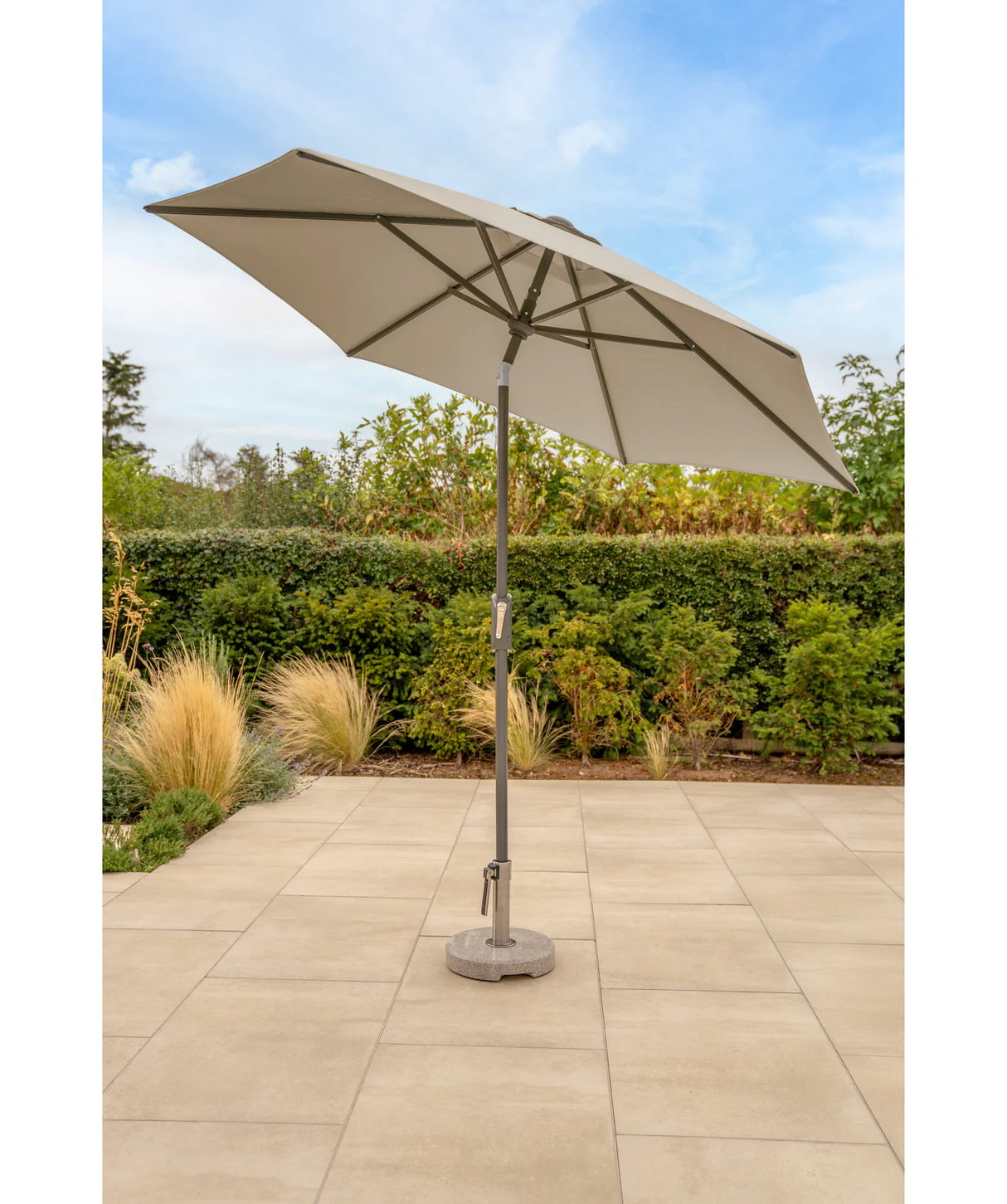 Kettler 2.5m stone canopy parasol with wind-up mechanism, auto tilt, and night cover for outdoor shading and furniture.