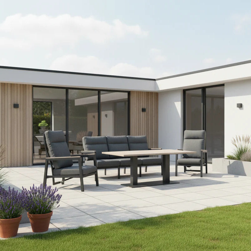 Kettler Tudor 3-seat sofa with two recliner chairs, matching bench, and 140x80cm metal table in a stylish outdoor lounge set.