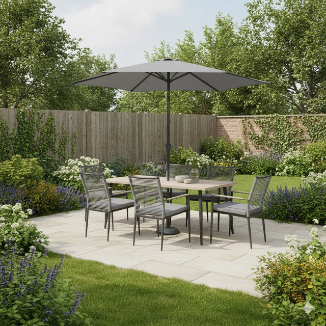Kettler Charlbury Merano 6-seat metal dining set with 170x90cm table, parasol, and base in a stylish outdoor setting.