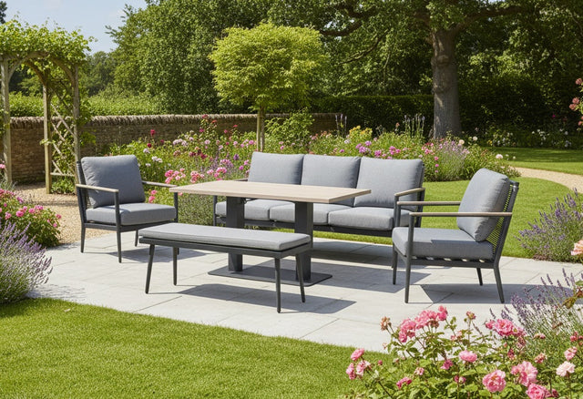 Kettler Merano aluminium 7-seat sofa set with high/low table, includes three-seat sofa, armchairs, bench, and outdoor furniture.