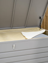 Open Kettler Pebble aluminium storage cushion box showing interior space and sleek metallic finish for outdoor furniture storage.