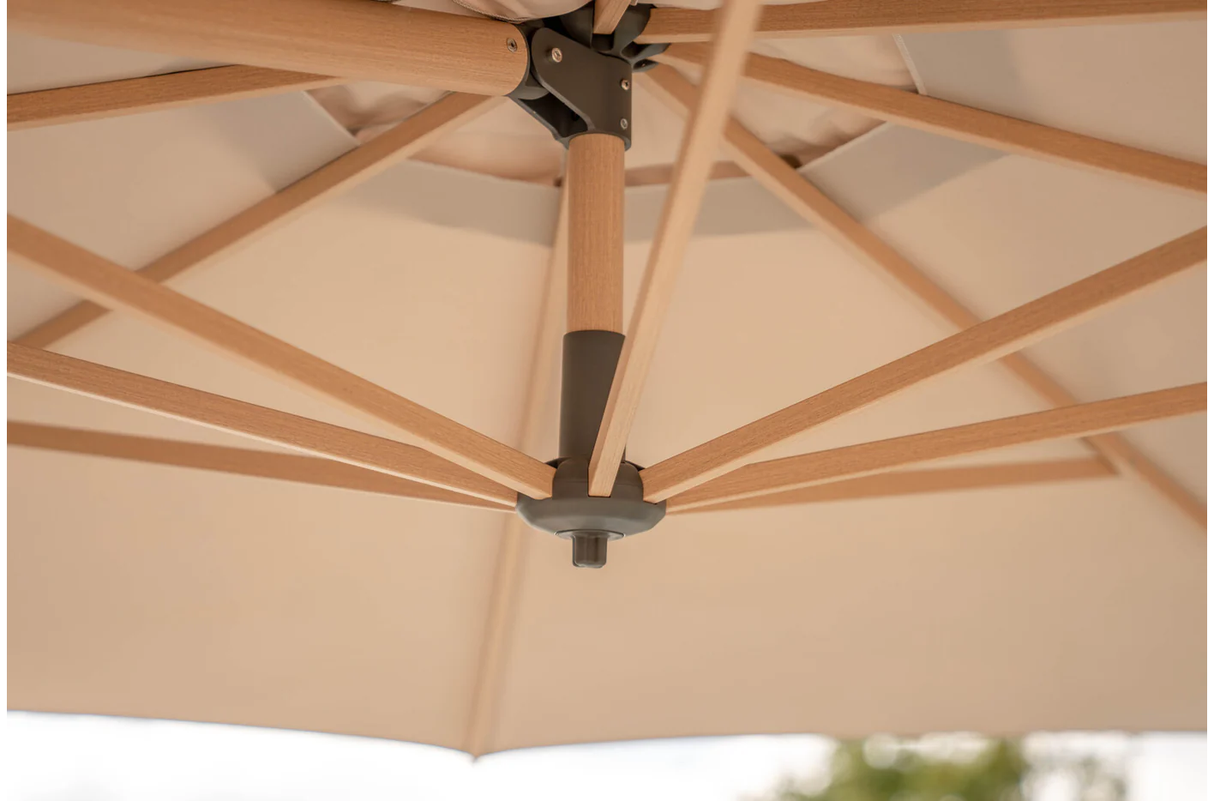 Kettler Luna 3m round cantilever parasol with taupe and grey canopy, granite base, and night cover for outdoor shade.