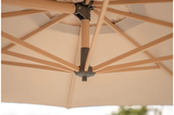 Kettler Luna 3m round cantilever parasol with taupe and grey canopy, granite base, and night cover for outdoor shade.