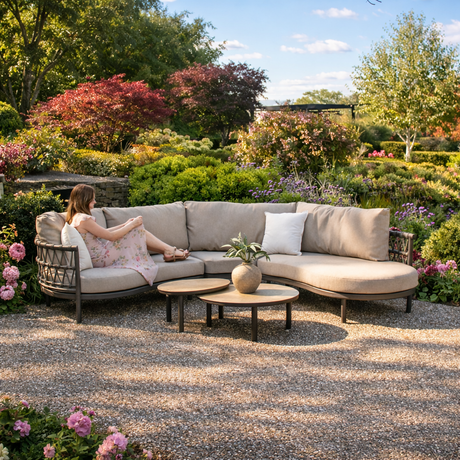 4 Seasons Outdoor Piacenza modular lounge set with latte-colored cushions and Monroe coffee tables, outdoor metal furniture for patio use.