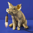 Gold Werner Vob WERNS® Piggy Pig table lamp with a stylish pig design, perfect for luxury indoor statement lighting.