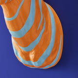Blue and orange zebra-shaped wall lamp by Werner Vob, stylish indoor statement lighting for modern home decor.