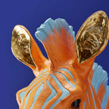 Werner Vob WERNS Zebra Zora wall lamp featuring blue and orange zebra design, modern indoor statement lighting for home decor.