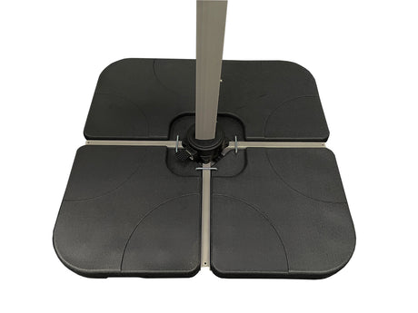 Hartman 4-piece resin water-filled cantilever parasol base with handle and wheels, suitable for outdoor patio umbrellas.
