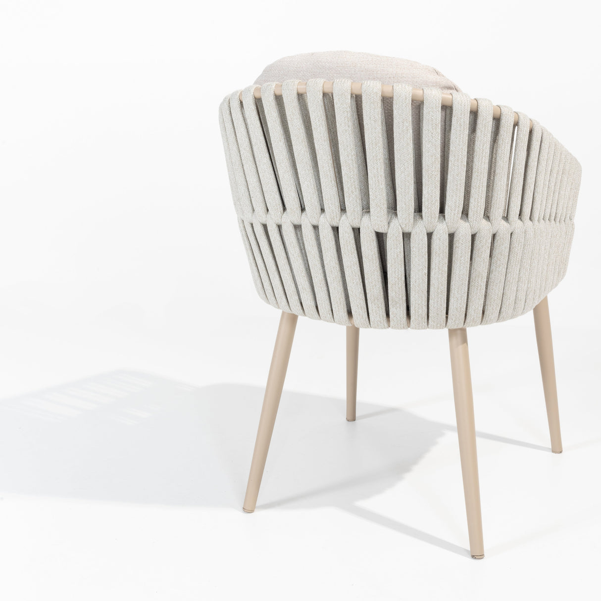 4 Seasons Outdoor Eva 6-seat metal dining set with Manolo 180cm barrel ceramic table and latte-colored dining chairs with cushions.