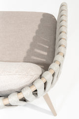 4 Seasons Outdoor Eva 6-seat metal dining set with Manolo 180cm barrel ceramic table and latte-colored chairs with cushions.