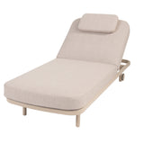 4 Seasons Outdoor Milano sunbed in latte color with cushion and headrest, outdoor metal furniture for relaxing lounging.