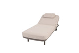 4 Seasons Outdoor Milano Terre sunbed in latte color with cushion and headrest, metal outdoor furniture for relaxation.