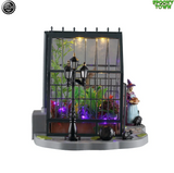 Lemax Spooky Town Agatha's Greenhouse table accent with spooky, detailed greenhouse scene in green and black colors.