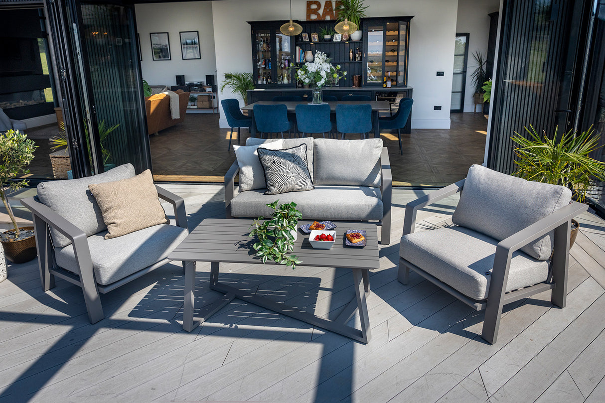 Hartman Alora 2-seat lounge set in taupe with metal frame, featuring cushioned seats and a modern outdoor furniture design.