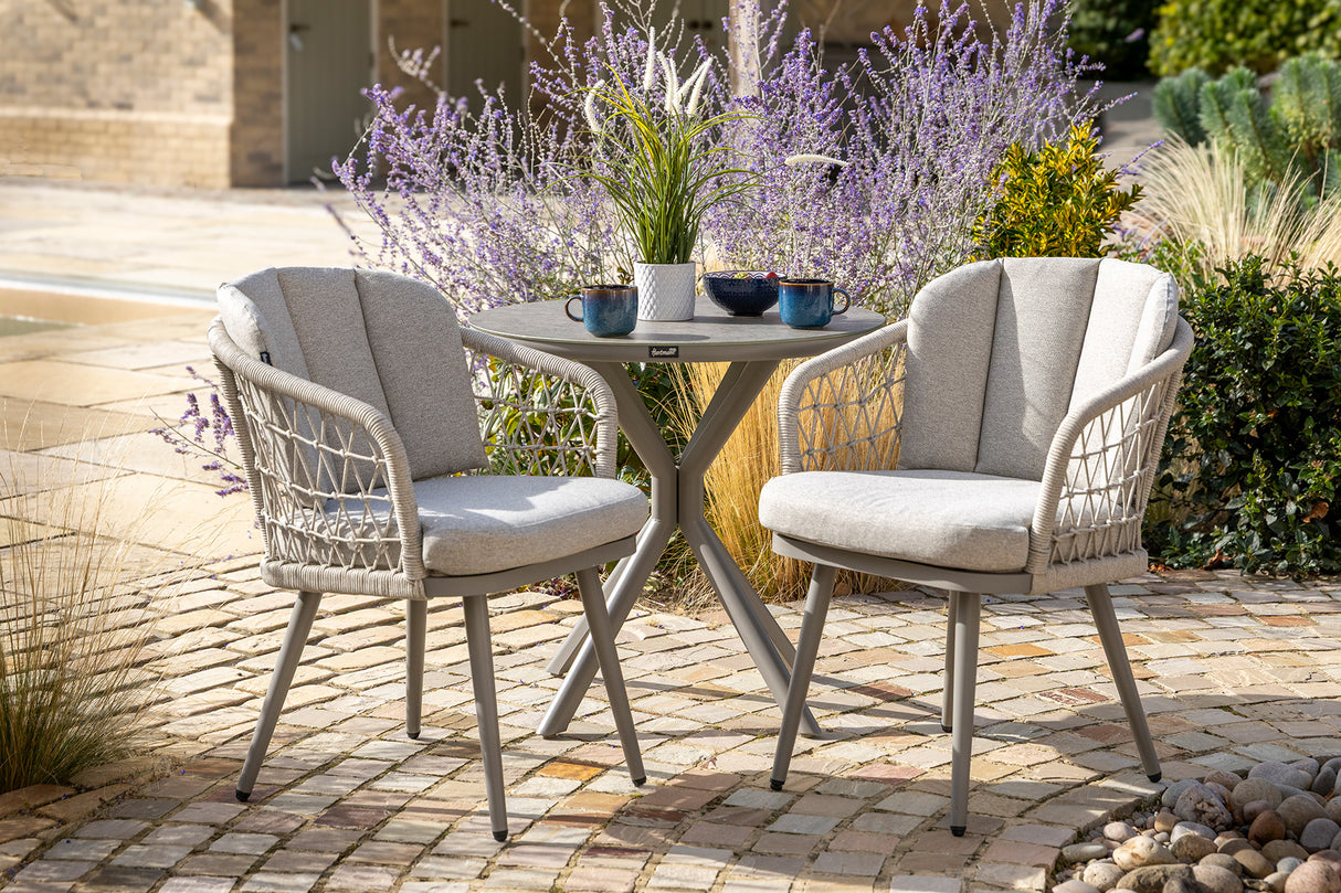 Hartman Aries Bistro Set with metal table and two chairs, ideal for outdoor patio or garden dining.