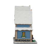 Lemax Carol Residence illuminated building from the Lemax Christmas Village collection, featuring festive holiday decorations and lights.
