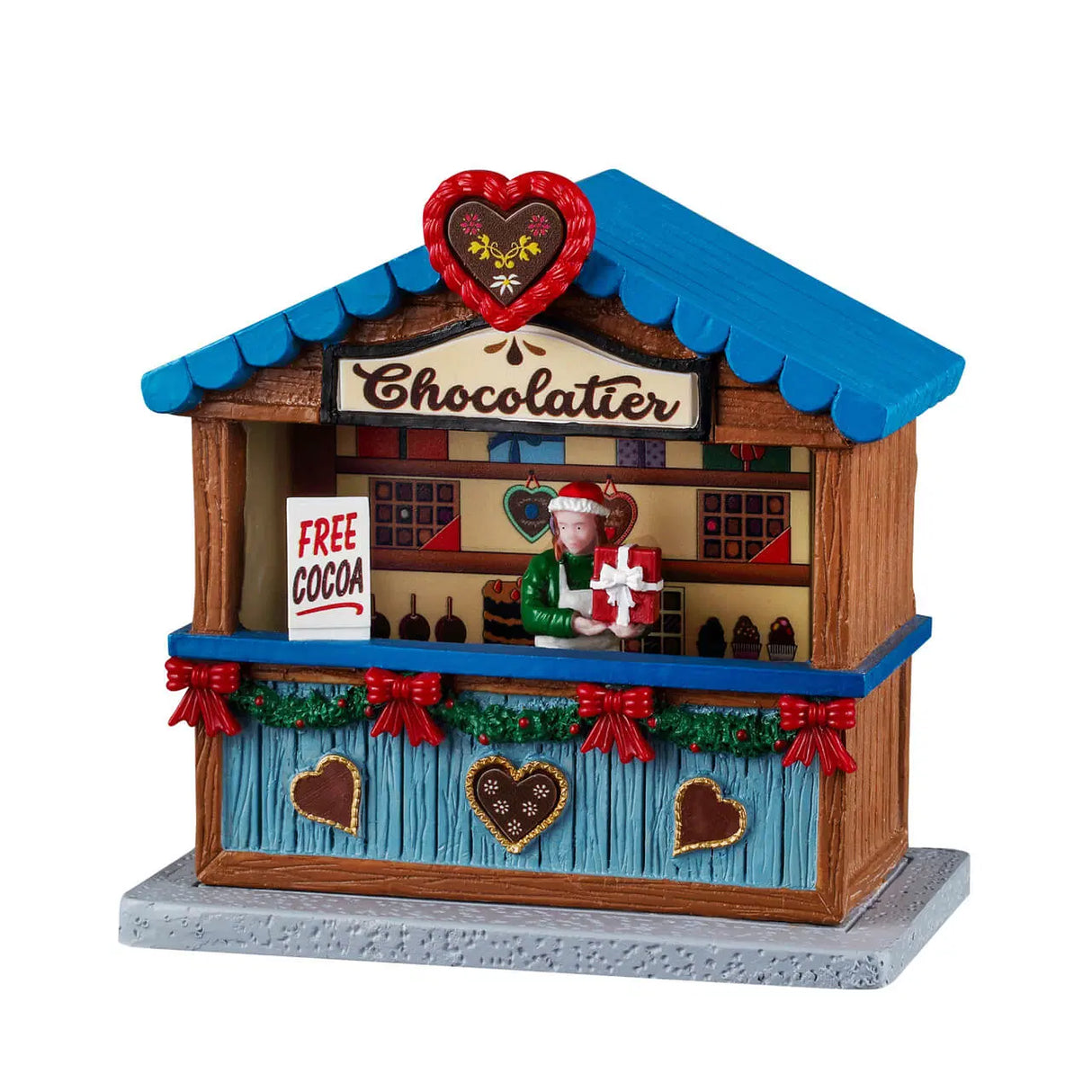 Lemax Chocolatier Christmas Village table accent featuring a detailed chocolate shop scene with festive holiday decorations.