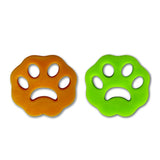 Creative Products Fuzz Buster pet hair and lint remover in assorted colors, handheld tool for removing pet hair and lint from fabrics.
