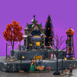 Lemax Spooky Town Creatures of the Night Pet Shop set with illuminated haunted pet shop building and spooky animal displays.